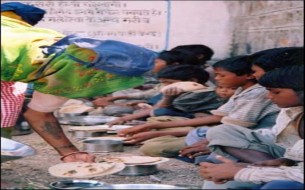 Mid Day Meal Beneficiaries having lunch at a school in Baran