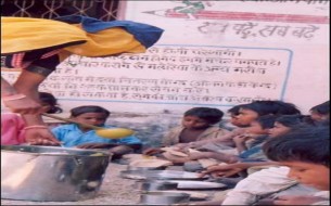Mid day meal being served to the school children in baran